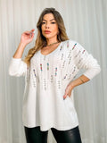Suéter oversize con pedrería
